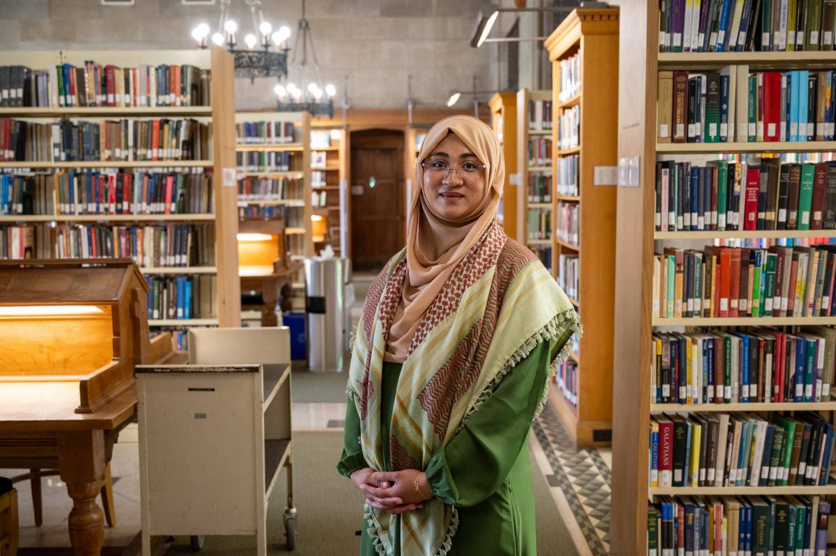 Beena Syed in Emmanuel College library.